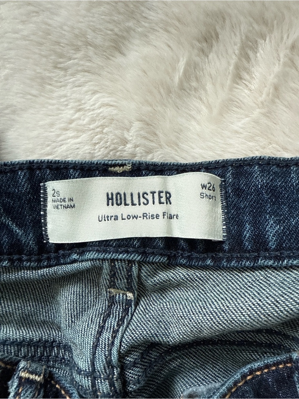 Hollister Ultra Low-Rise Flare Jeans in Medium Blue Denim